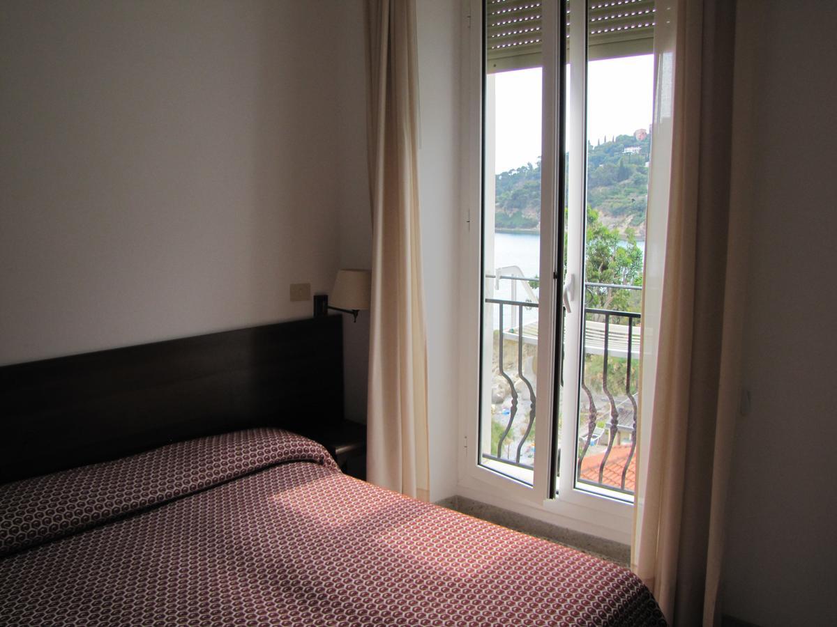 Holiday'S Beach Aparthotel เวนติมิญา ภายนอก รูปภาพ